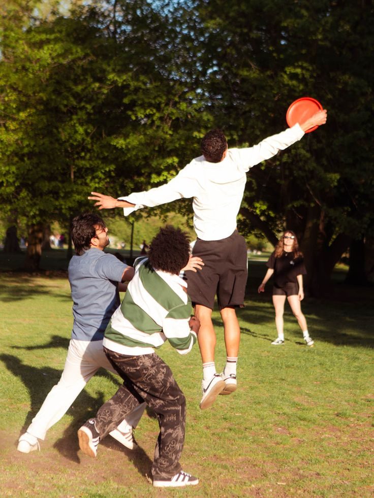 Young people playing a game in the park